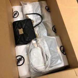 Black ⚫️  and silver chain MK Serena bag. Simple and classy